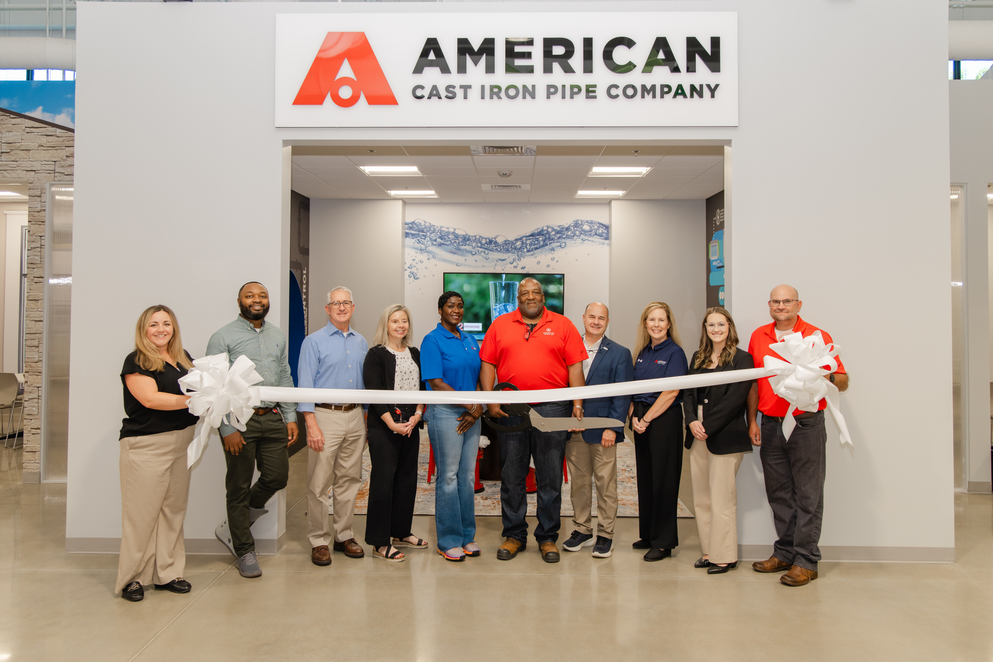 AMERICAN recently joined Junior Achievement of Alabama to celebrate the ribbon cutting of AMERICAN’s new storefront at the JA Economic Education Center.